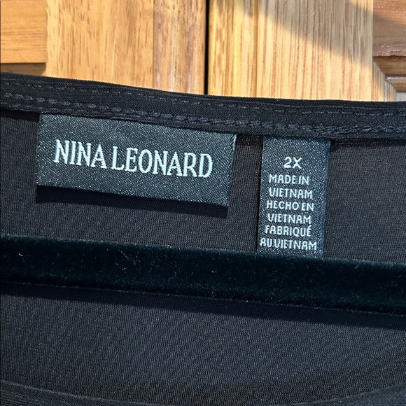 Pretty and fun black dress! See elegant lace accents and open shoulder design. - Picture 3 of 6